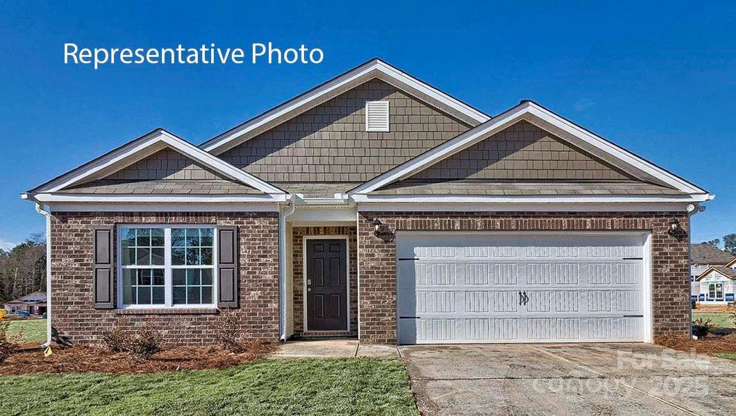 Front exterior of a new home in Woodhaven at Chester, Chester, SC, highlighting curb appeal (Image 1). Front exterior of a new home in Woodhaven at Chester, Chester, SC, highlighting curb appeal (Image 1).