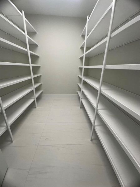 Furnished interior view inside a new home in Coral Isles at Avenir, Palm Beach Gardens (Image 8).