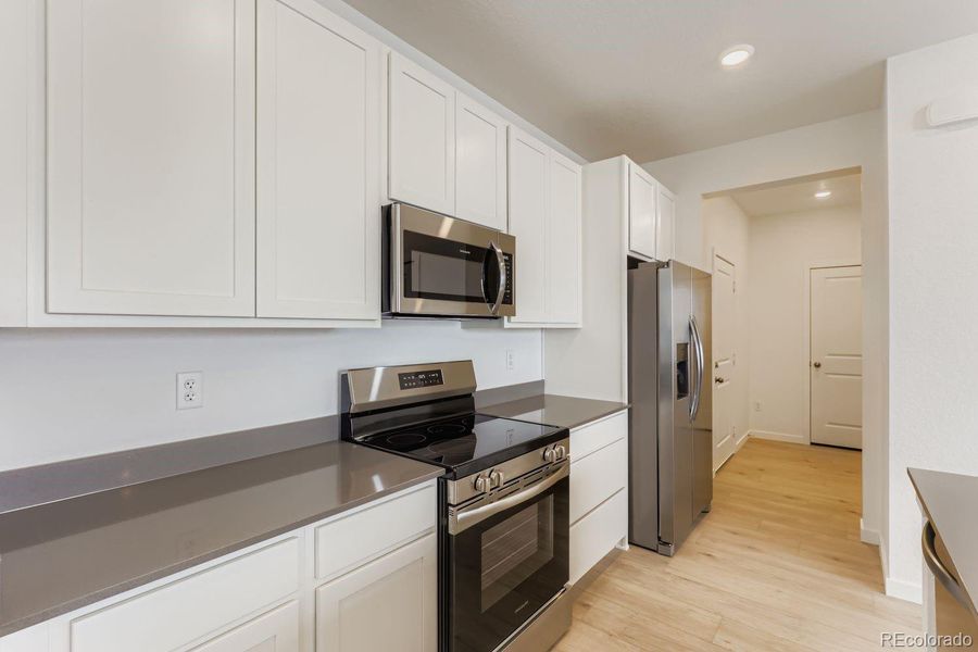 Furnished interior view inside a new home in Parterre, Thornton (Image 5).