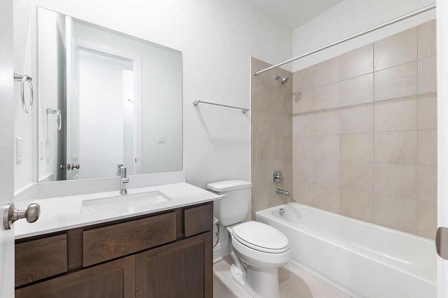 Furnished interior view inside a new home in The Colony - 50', Bastrop (Image 7).