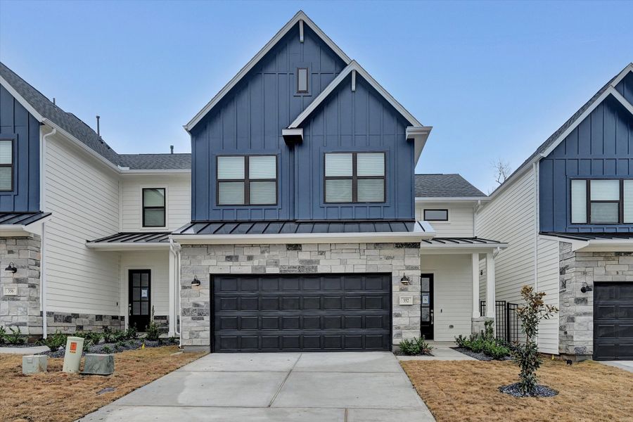 Front exterior of a new home in Summer Place 35', Montgomery, TX, highlighting curb appeal (Image 21). Front exterior of a new home in Summer Place 35', Montgomery, TX, highlighting curb appeal (Image 21).