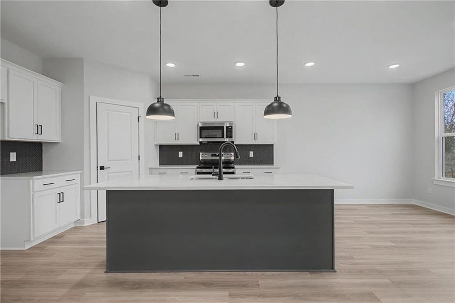 Furnished interior view inside a new home in The Park at Brighton, Locust Grove (Image 3).