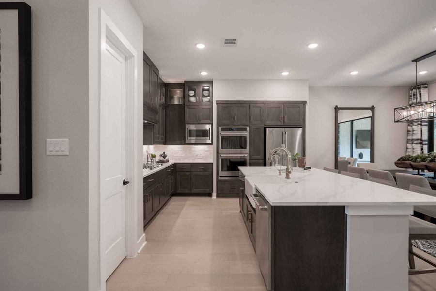 Representative furnished interior of a home built from the Barnhart by Tri Pointe Homes in Amethyst at Azalea Trails, Cypress (Image 10).