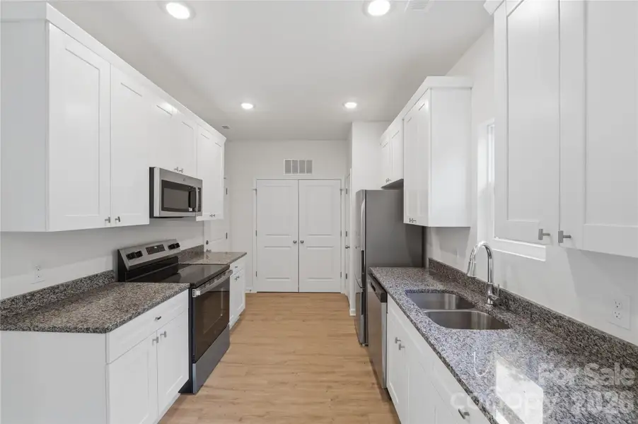 Furnished interior view inside a new home in , Statesville (Image 4).