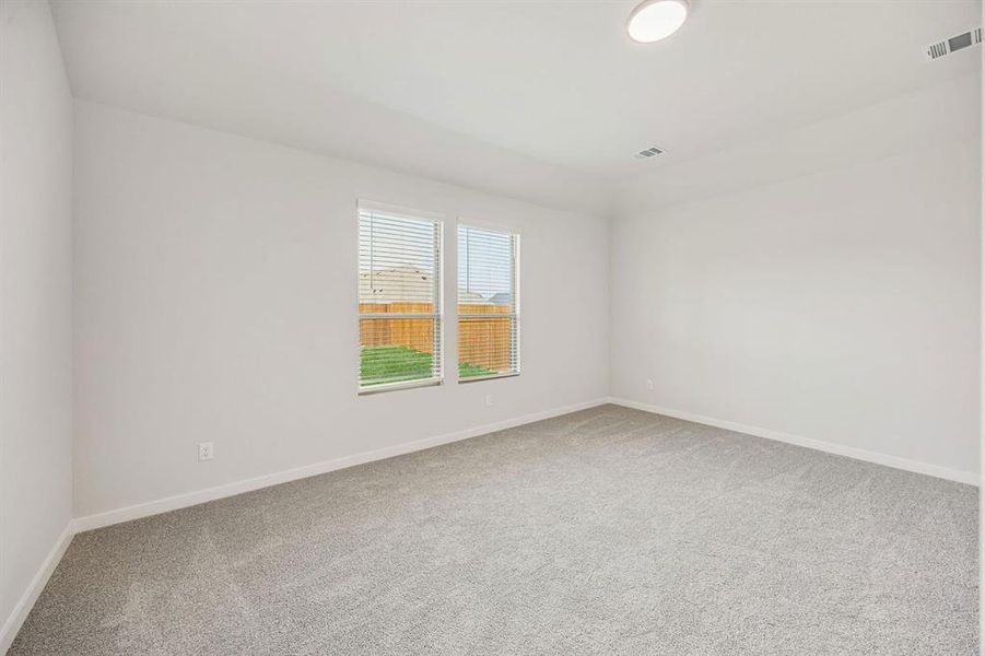 Primary Suite in the Stanley II home plan by Trophy Signature Homes – REPRESENTATIVE PHOTO