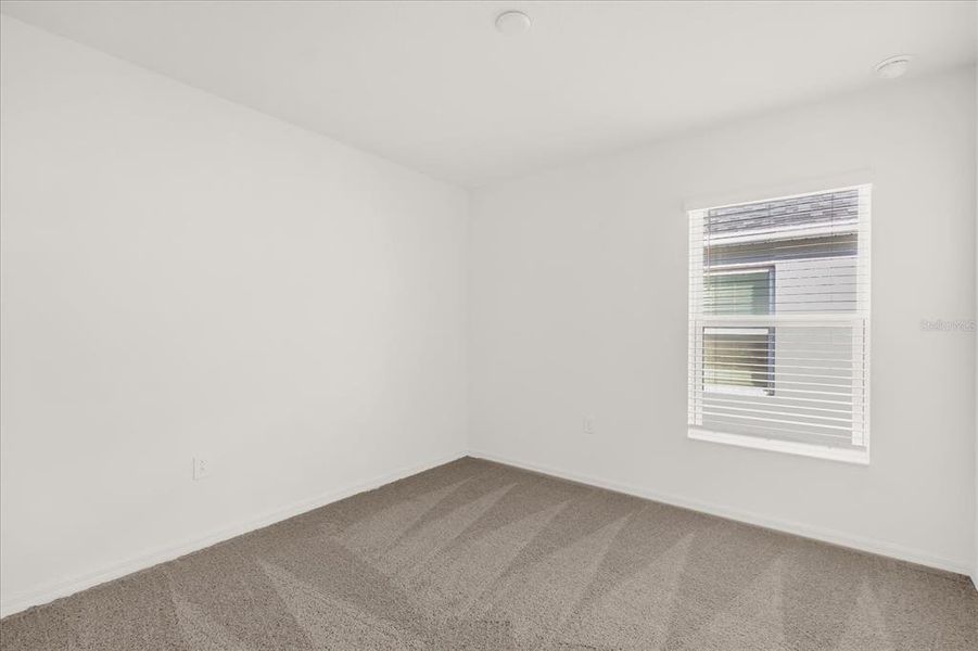 Spacious, unfurnished interior of a new home in Robins Run, Lake Wales (Image 12).
