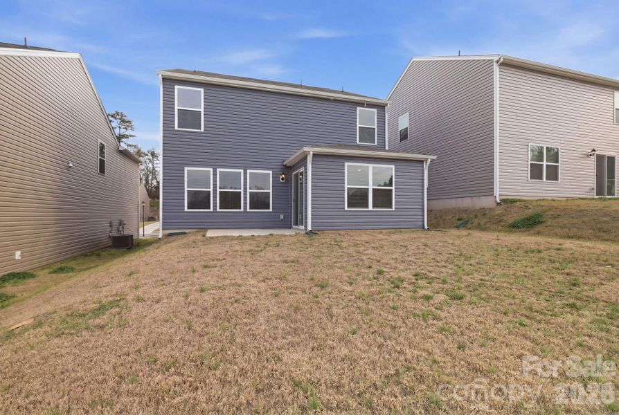Exterior details and patio area of a home in Huffman Ridge, Hickory (Image 20).