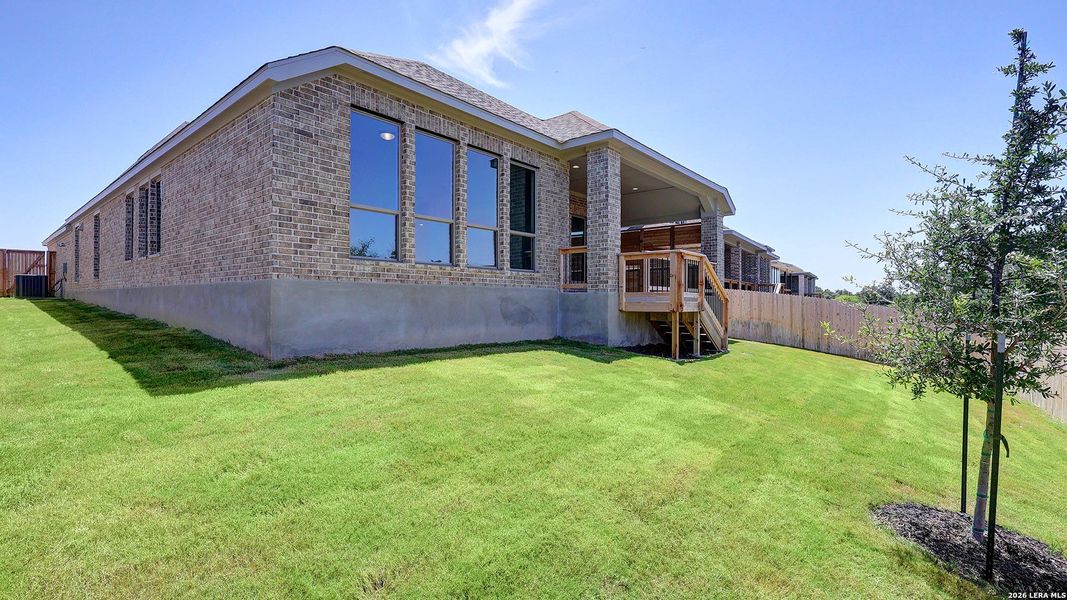 Exterior details and patio area of a home in Ladera, San Antonio (Image 24).