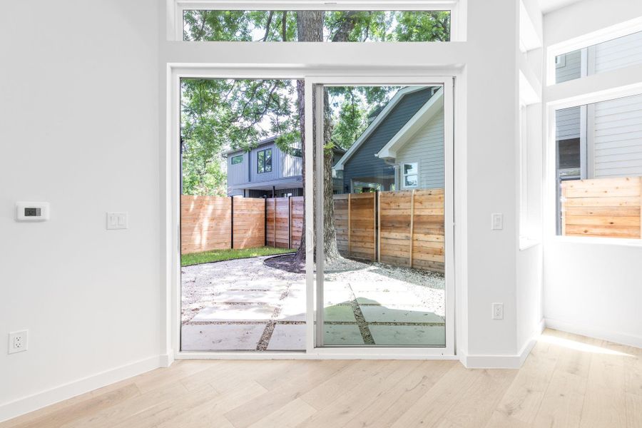 Entryway featuring wood finished floors and baseboards Entryway featuring wood finished floors and baseboards