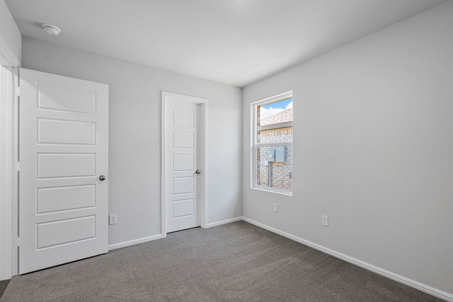 Representative unfurnished interior of a home built from the BELLVUE by D.R. Horton in Faculty Row, Abilene (Image 54).