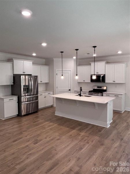 Furnished interior view inside a new home in Westport Freedom Series, York (Image 9).