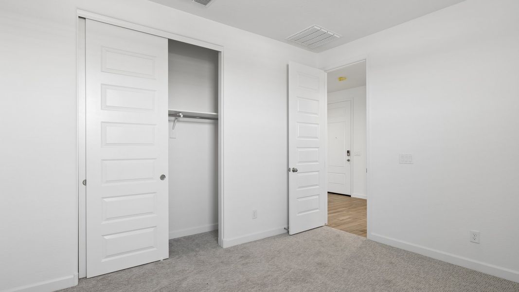 Spacious, unfurnished interior of a new home in Radiance at Superstition Vistas, Apache Junction (Image 34).