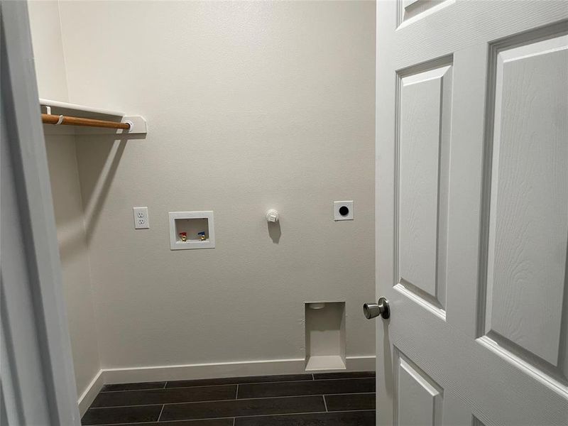 Laundry area featuring electric dryer hookup and hookup for a washing machine