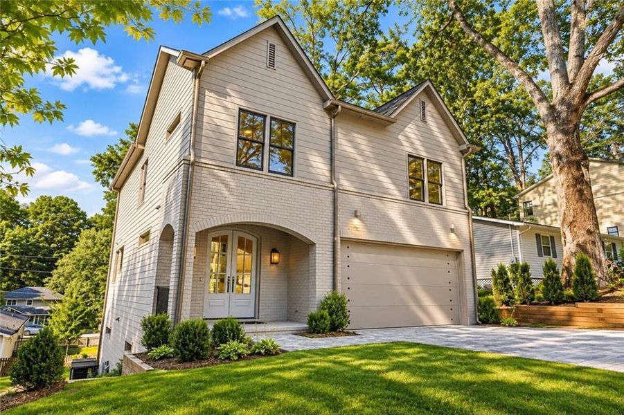 Front exterior of a new home in , Scottdale, GA, highlighting curb appeal (Image 23).