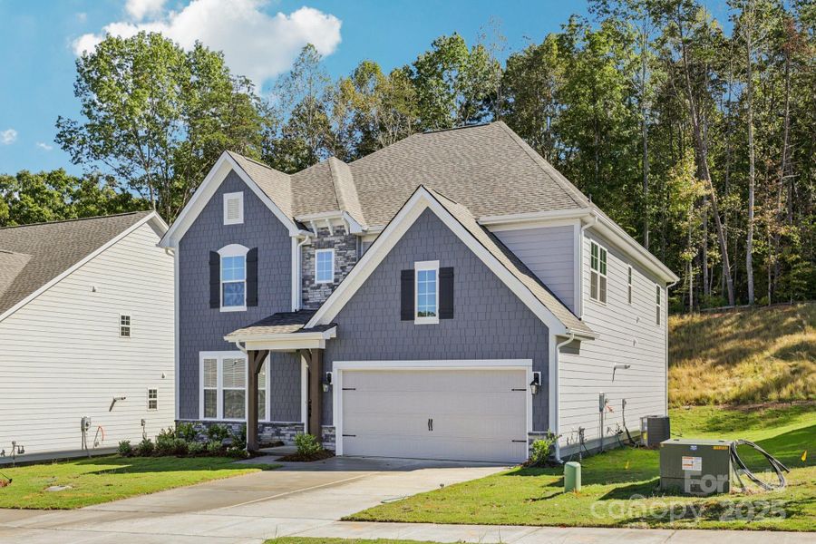 Front exterior of a new home in Falls Cove, Troutman, NC, highlighting curb appeal (Image 19).