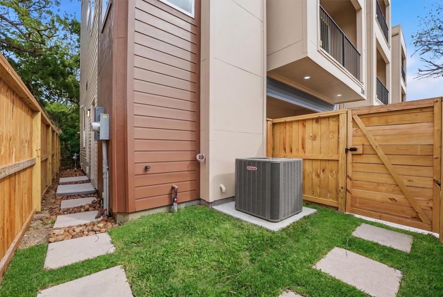 Separate, gated entry way into the downstairs studio apartment offering total privacy for a tenant if desired.