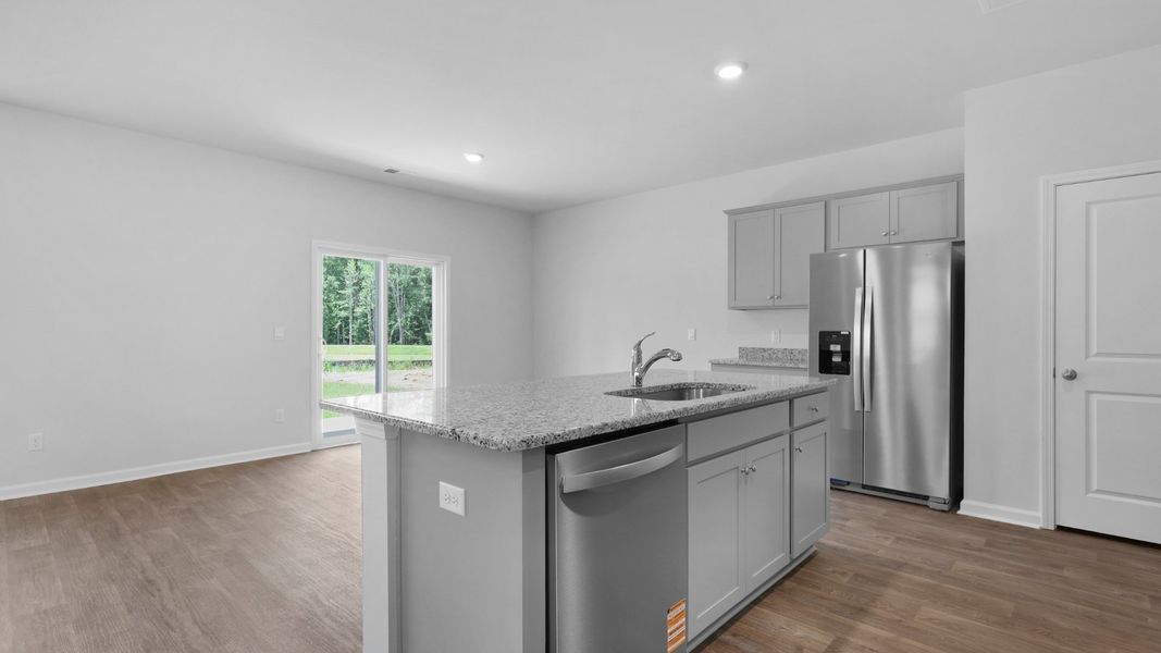 Representative furnished interior of a home built from the Aisle by D.R. Horton in Pine Hills at Cane Bay, Summerville (Image 6).