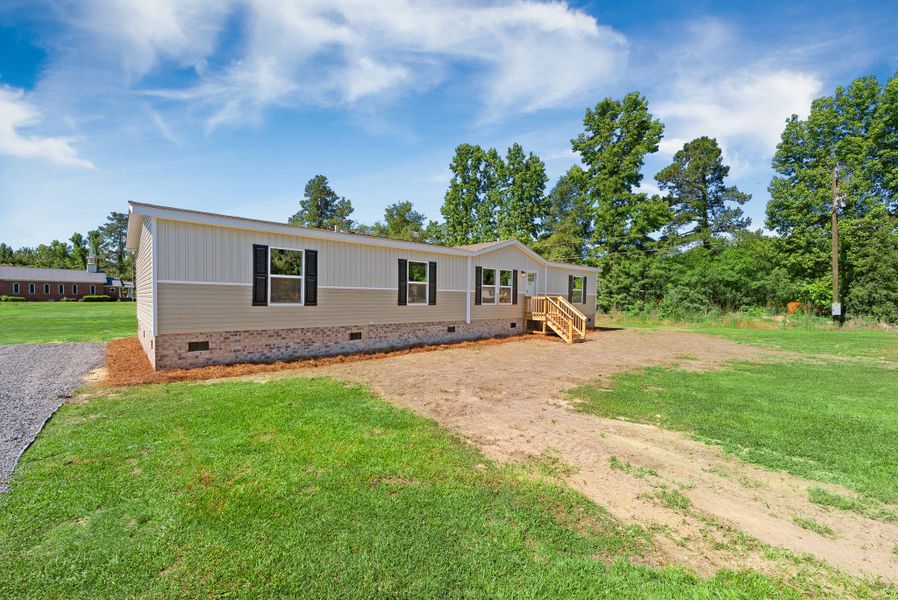 Exterior details and patio area of a home in , Bonneau (Image 19). Exterior details and patio area of a home in , Bonneau (Image 19).