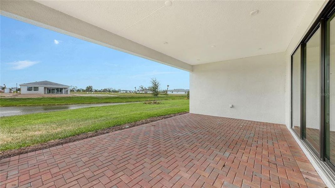 Exterior details and patio area of a home in Woodland Preserve, Parrish (Image 4).