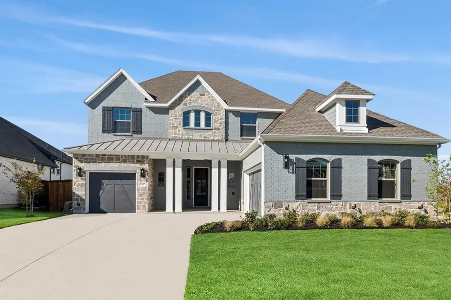Front exterior of a new home in South Pointe  Village Series, Mansfield, TX, highlighting curb appeal (Image 1).