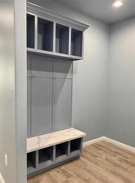 A well-appointed mudroom offers functional storage with cubbies and hooks, ideal for everyday organization. A well-appointed mudroom offers functional storage with cubbies and hooks, ideal for everyday organization.