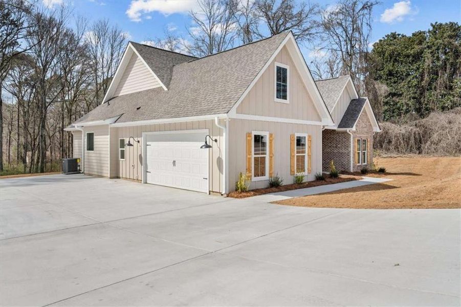 Front exterior of a new home in , Temple, GA, highlighting curb appeal (Image 19).
