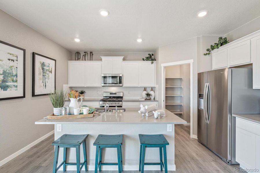 Furnished interior view inside a new home in Trails at Crowfoot, Parker (Image 19).