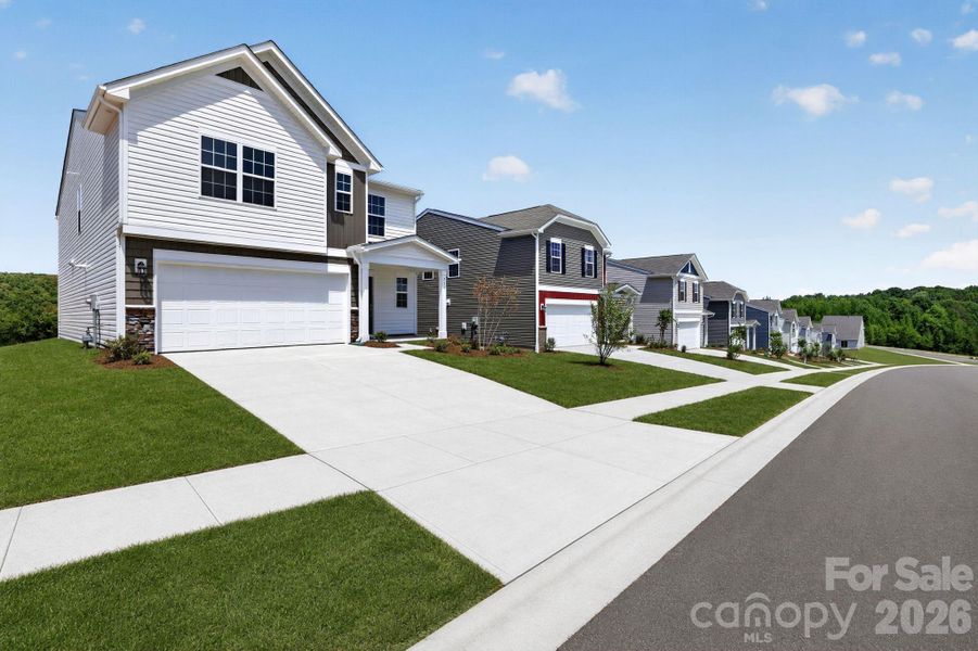 Front exterior of a new home in Cleveland Hill, Shelby, NC, highlighting curb appeal (Image 1). Front exterior of a new home in Cleveland Hill, Shelby, NC, highlighting curb appeal (Image 1).