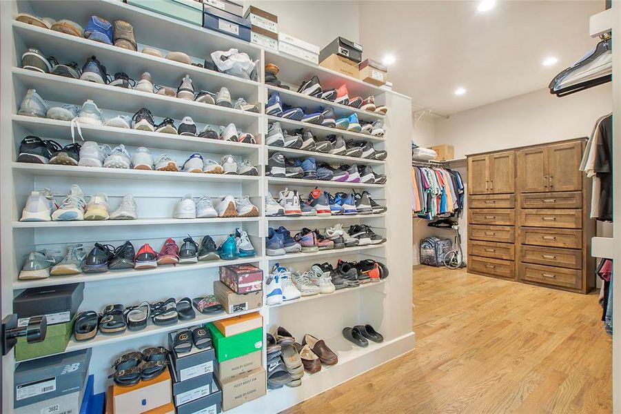 Primary closet with custom built-ins.