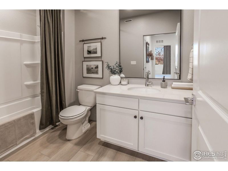 Furnished interior view inside a new home in Prairie Song Story Collection - Single Family Homes, Windsor (Image 38).