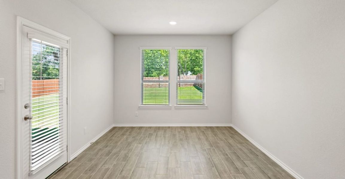 Representative exterior photo of a completed home built from the Hadleigh by Impression Homes in Mountain Valley, Burleson, TX (Image 10). Representative exterior photo of a completed home built from the Hadleigh by Impression Homes in Mountain Valley, Burleson, TX (Image 10).