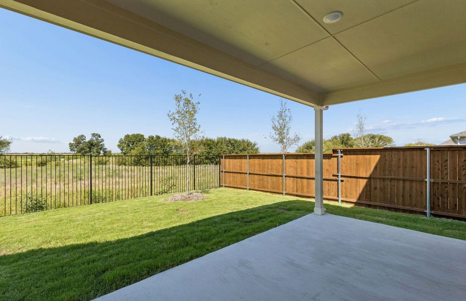 Exterior details and patio area of a home in Creekview Meadows, Pilot Point (Image 3).