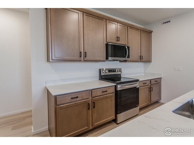 Furnished interior view inside a new home in Bloom Trailblazer Collection - Single Family Homes, Fort Collins (Image 7).
