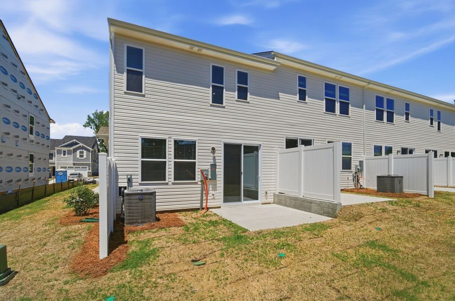 Exterior details and patio area of a home in Stonesummit at Reedy Creek, Charlotte (Image 16).