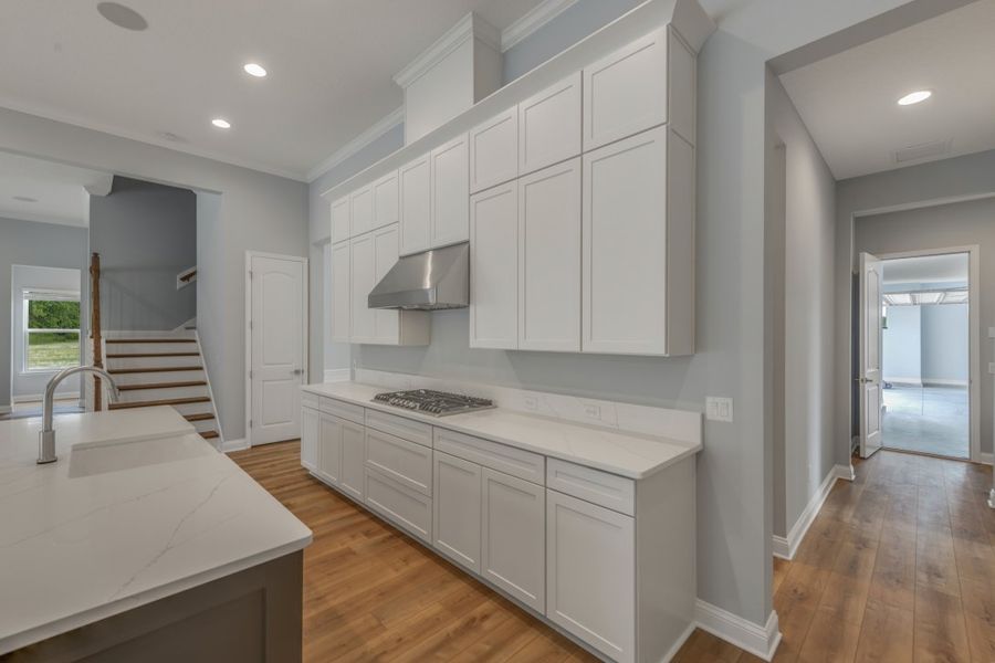 Representative furnished interior of a home built from the Caspian by Riverside Homes in Hidden Creek at SilverLeaf, St. Augustine (Image 17).