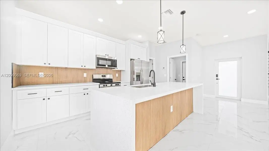 Furnished interior view inside a new home in , Cape Coral (Image 4).