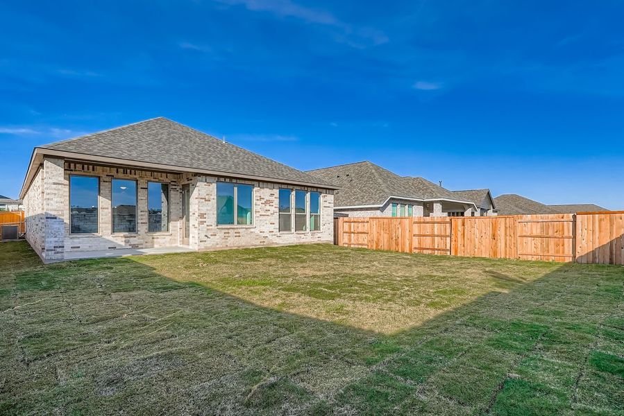 Exterior details and patio area of a home in 6 Creeks, Kyle (Image 3).