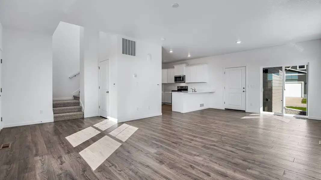 Spacious, unfurnished interior of a new home in Sky Ranch, Watkins (Image 12).