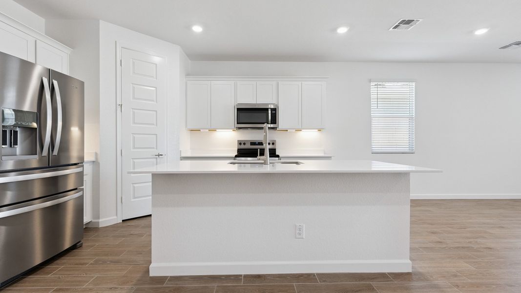 Furnished interior view inside a new home in Zanjero Pass, Waddell (Image 6).