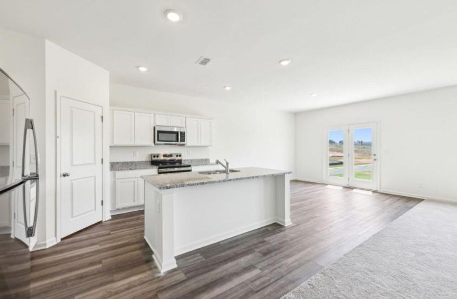 Furnished interior view inside a new home in Sunterra Lakes, Brookshire (Image 9).