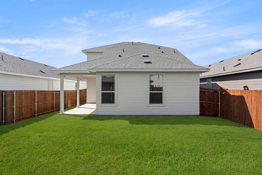 Front exterior of a new home in Creekside Ranch, Blue Ridge, TX, highlighting curb appeal (Image 17).