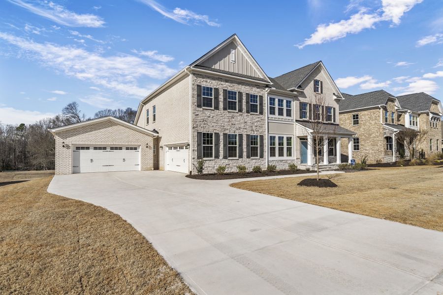 Front exterior of a new home in Walnut Grove, Easley, SC, highlighting curb appeal (Image 24).