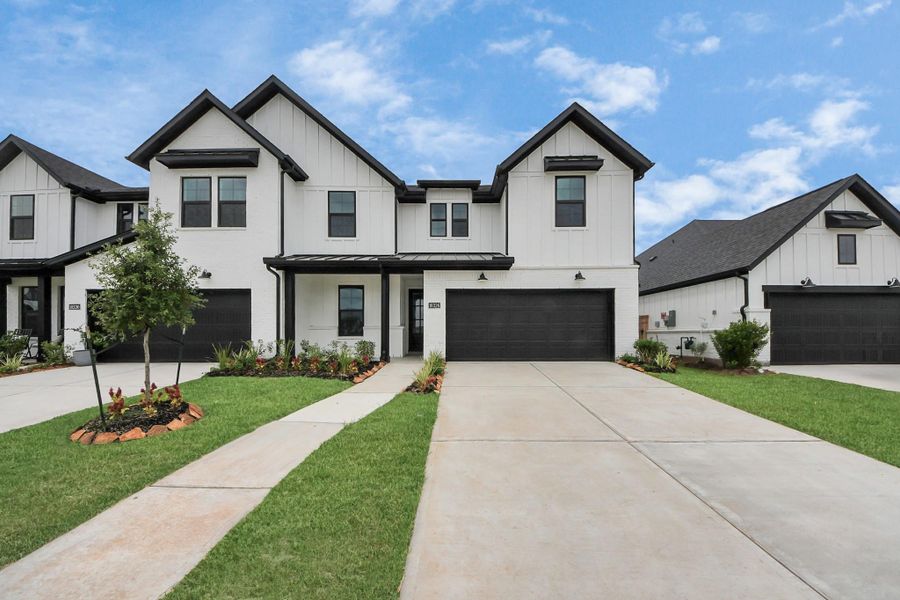 Front exterior of a new home in , Missouri City, TX, highlighting curb appeal (Image 24).