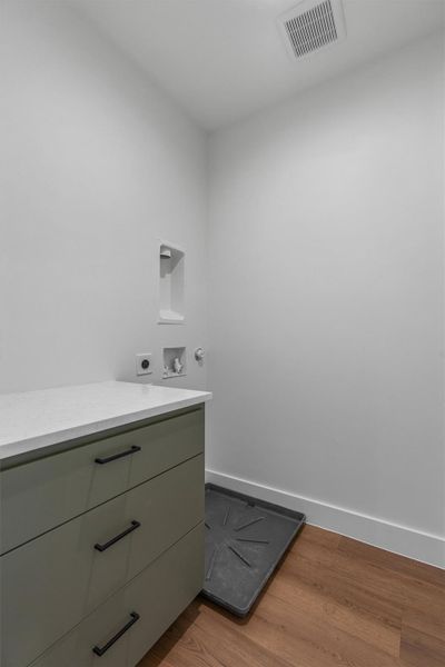 Laundry Room with Folding Table on 2nd Floor