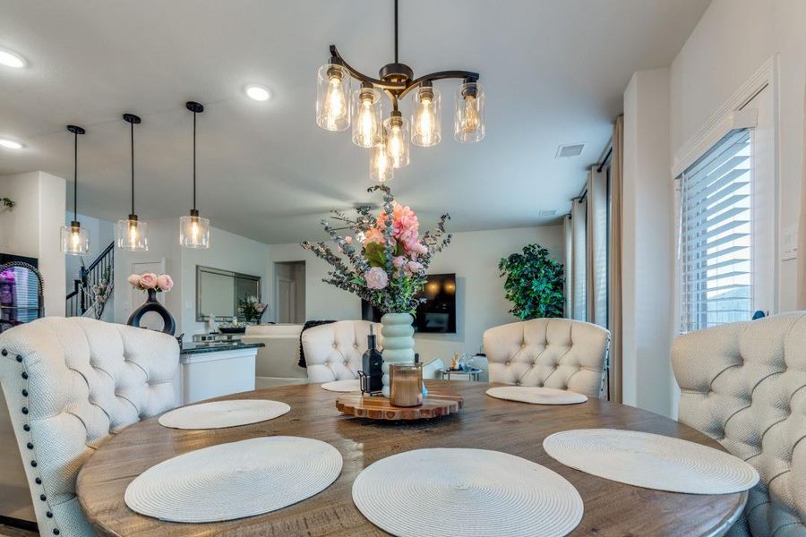 The open layout flows into a cozy living space, creating a welcoming atmosphere for entertaining.