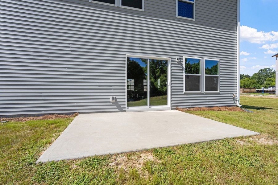 Exterior details and patio area of a home in Cambridge Reserve, Angier (Image 3). Exterior details and patio area of a home in Cambridge Reserve, Angier (Image 3).