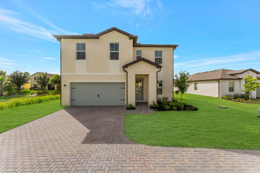 Front exterior of a new home in , Fort Pierce, FL, highlighting curb appeal (Image 25).
