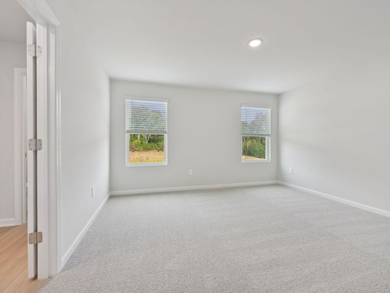 Spacious, unfurnished interior of a new home in Oakwood Townes, Mebane (Image 12).