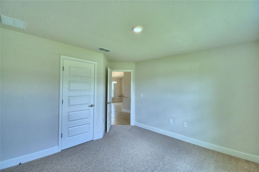 Spacious, unfurnished interior of a new home in Cadence Crossing, Auburndale (Image 24).