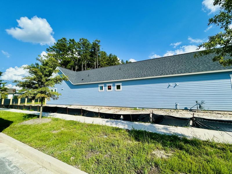 Exterior details and patio area of a home in The Domus Collection at Midtown Nexton, Summerville (Image 33).